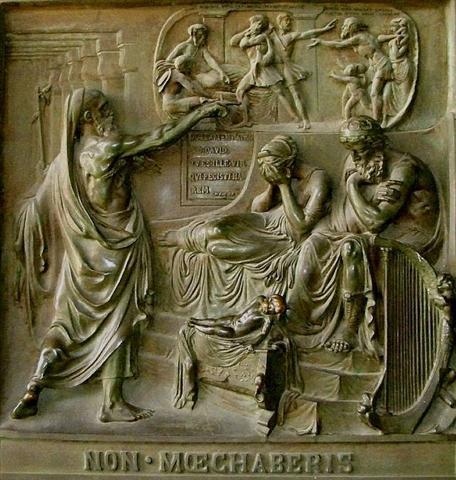Nathan points at a distraught Bathsheba and a thoughtful David as they ponder a dead infint.