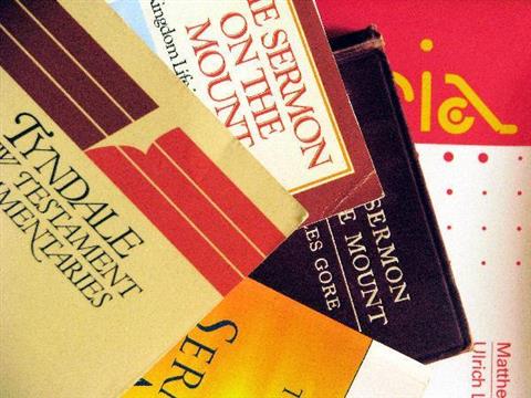 Several books with red, yellow and orange covers